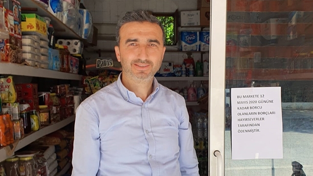 Antalya'da iki bakkalın veresiye defterindeki borçlar ödendi