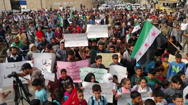 Cerablus'ta yaşayan Münbiçliler Esed rejimini protesto etti