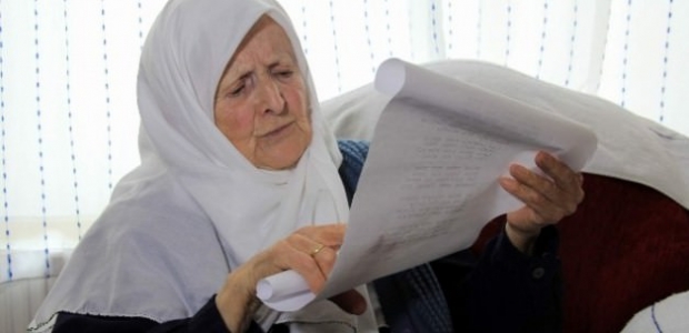 Evine Erdoğan fotoğrafı astığı için şiddet gördü