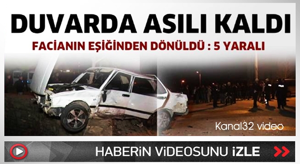 Duvarda asılı kaldı