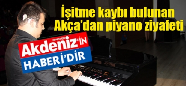 İşitme kaybı bulunan Akça’dan piyano ziyafeti