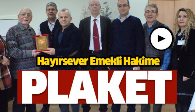 Hayırsever emekli hakime bağış plaketi