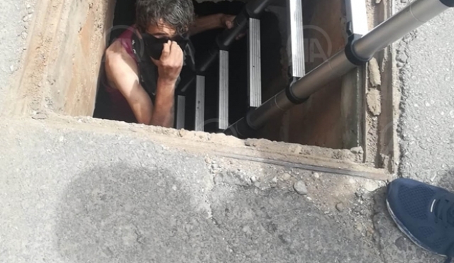 Karantina bölgesine kanalizasyondan girmeye çalışırken mahsur kalan kişi kurtarıldı