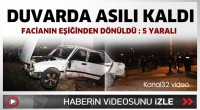 Duvarda asılı kaldı