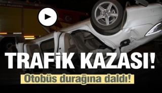Isparta'da otomobil takla atarak otobüs durağına daldı  