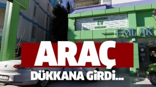  Otomobilin &ccedil;arptığı park halindeki ara&ccedil; d&uuml;kkana girdi  